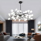 Branch chandelier giving ambient light over a cozy sofa area