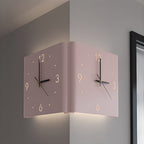 Modern wall clock lamp in a soft pink finish