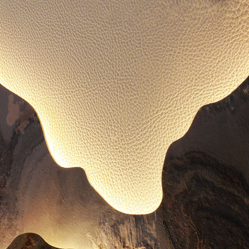 Detail of the warm backlight glowing behind the rock slab