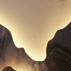 Detail of the warm backlight glowing behind the rock slab