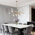 Multi-arm brass chandelier giving ambient light