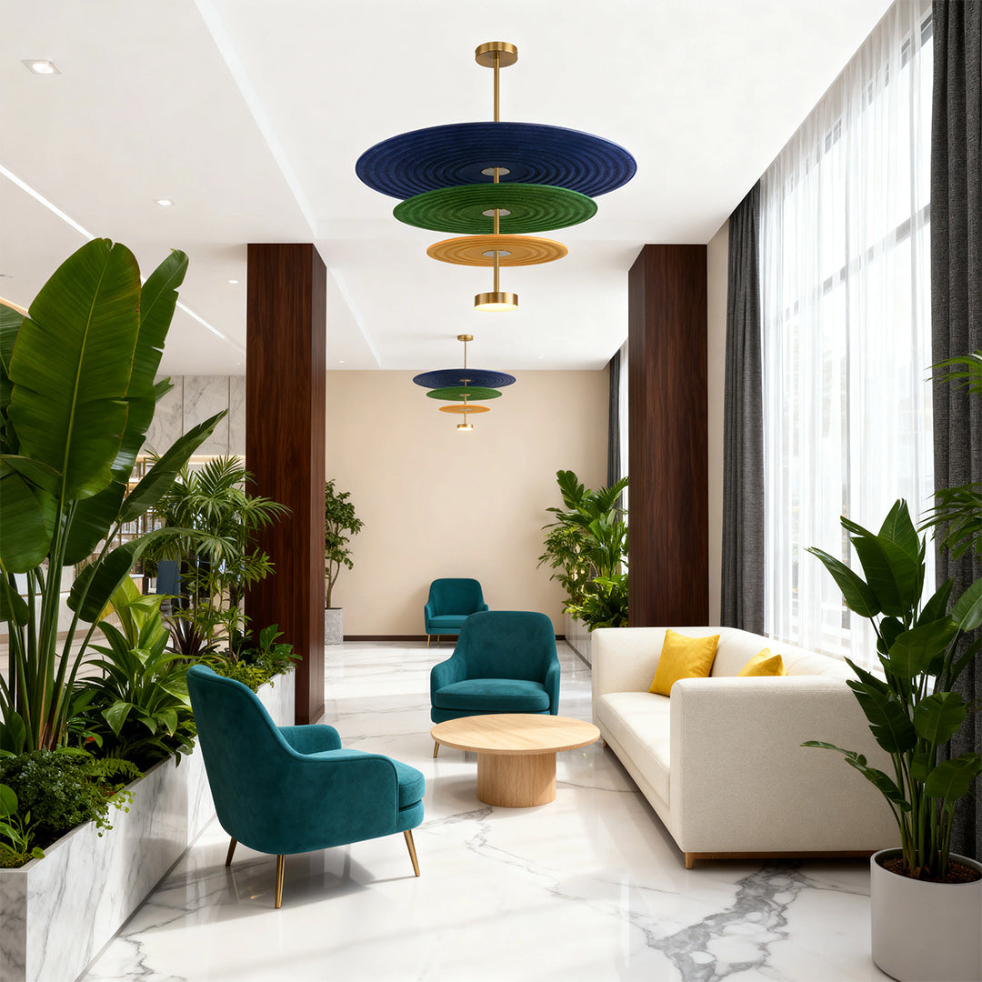 Cascading felt tier chandeliers hanging in a hotel lobby
