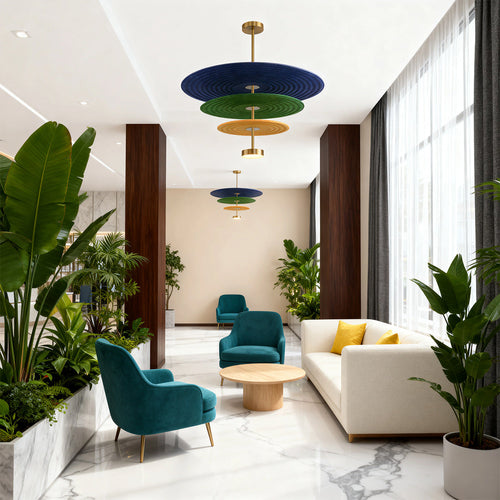 Cascading felt tier chandeliers hanging in a hotel lobby