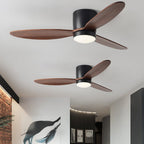 Minimalist wood ceiling fan against a modern interior ceiling