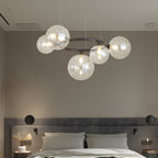 Copper globe chandelier giving soft light in a living room