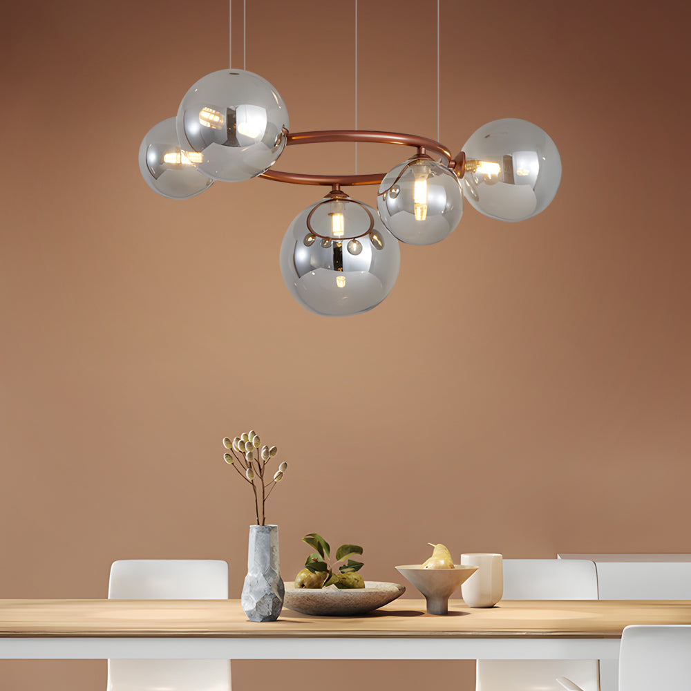 Opal glass globe chandelier in a minimalist modern dining area