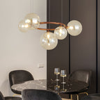 Globe chandelier above a stylish modern dining table
