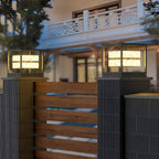 Solar post cap light on a pillar outside a modern house