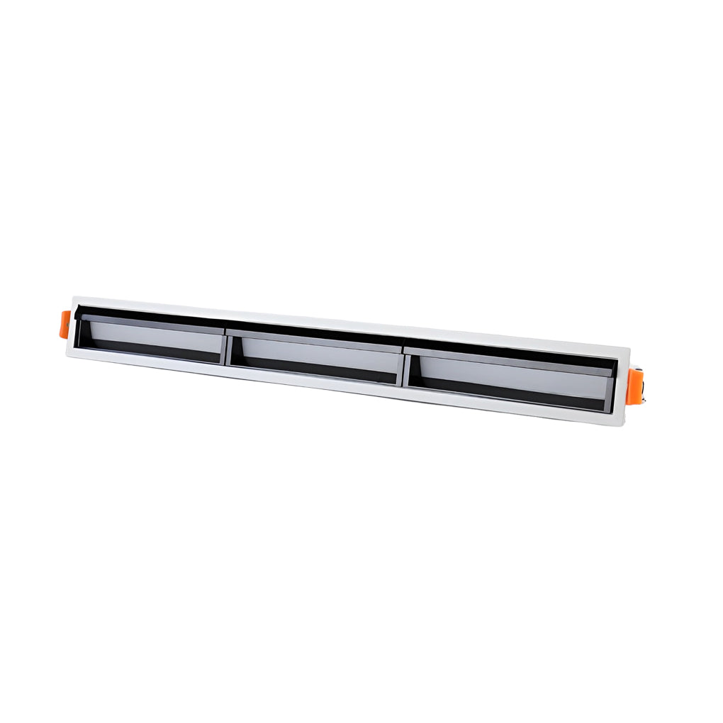 Multi-section recessed linear fixture with several spotlight heads