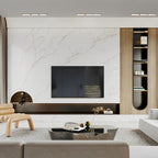 Recessed linear spotlights installed above a television wall
