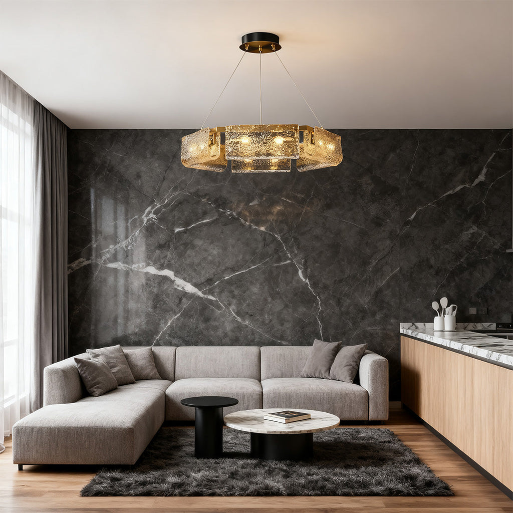 Glass chandelier giving warm light in a contemporary living room