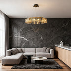 Glass chandelier giving warm light in a contemporary living room