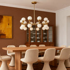 Small reflective spheres on the chandelier in a white room