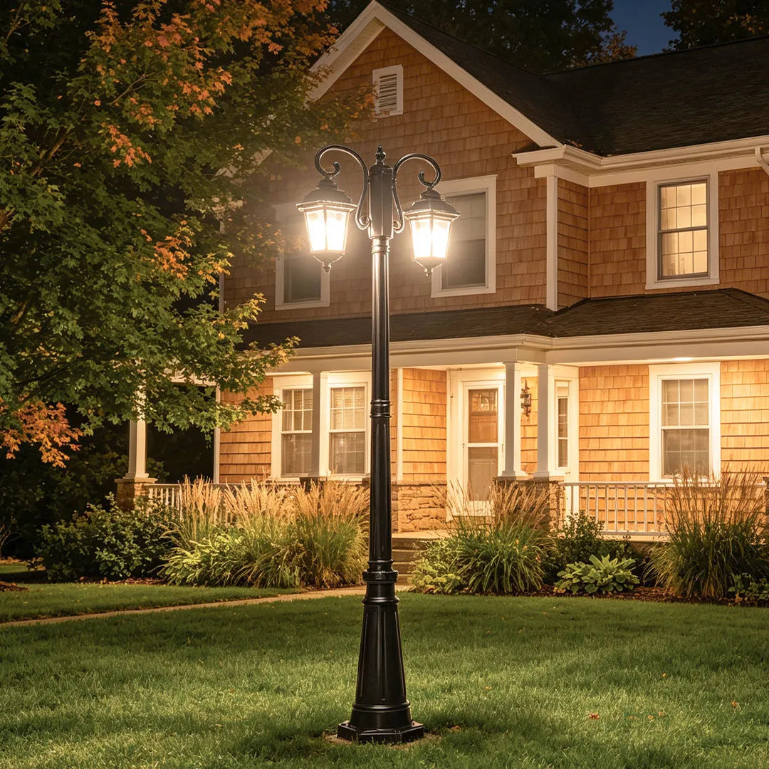 Retro lamp post standing on a front lawn