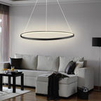 LED ring chandelier hanging in a minimalist living room