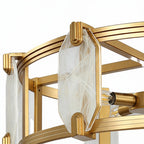 Gold framed chandelier with white glass panels shown lit
