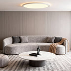 Round ceiling light giving a soft ambient glow