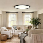 Round ceiling light lighting a bright living room