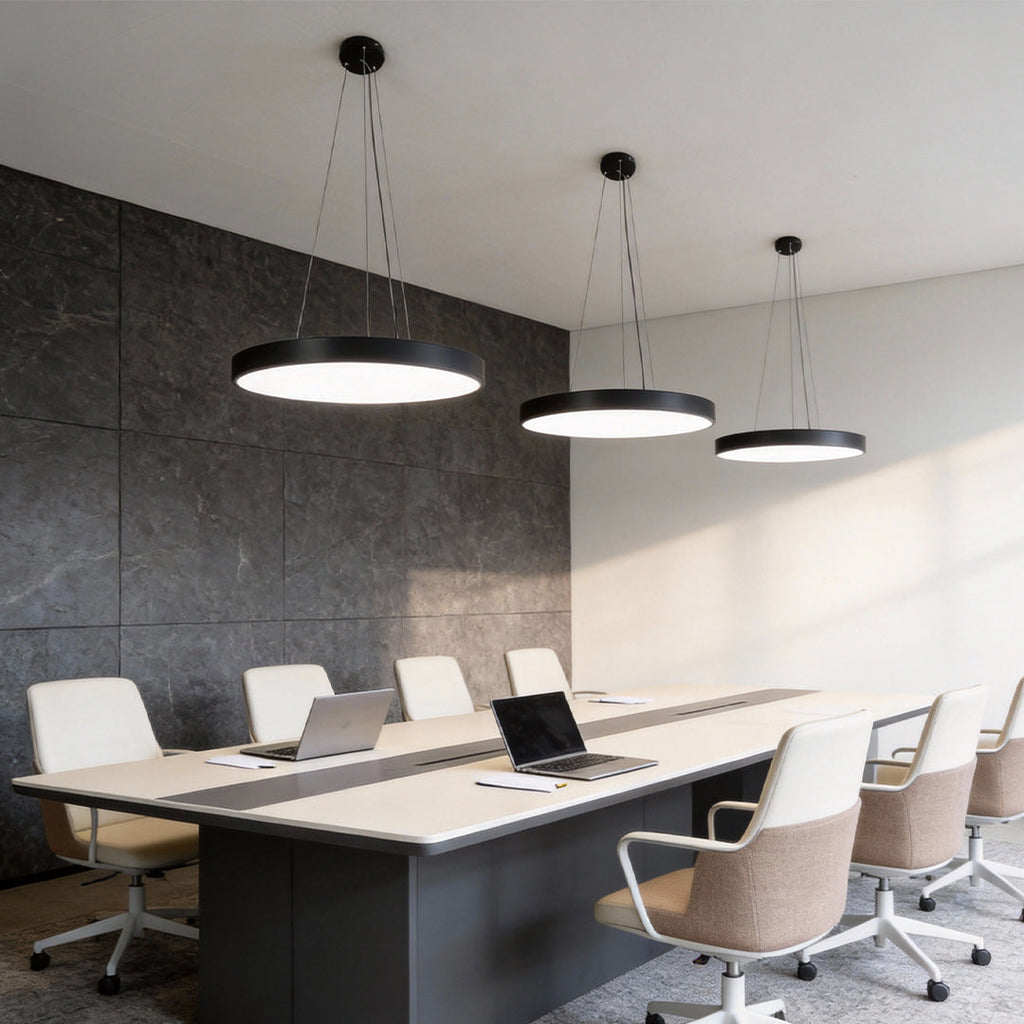 Round pendant lights in a designed conference room