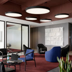 Round pendant lights hanging in a modern lounge