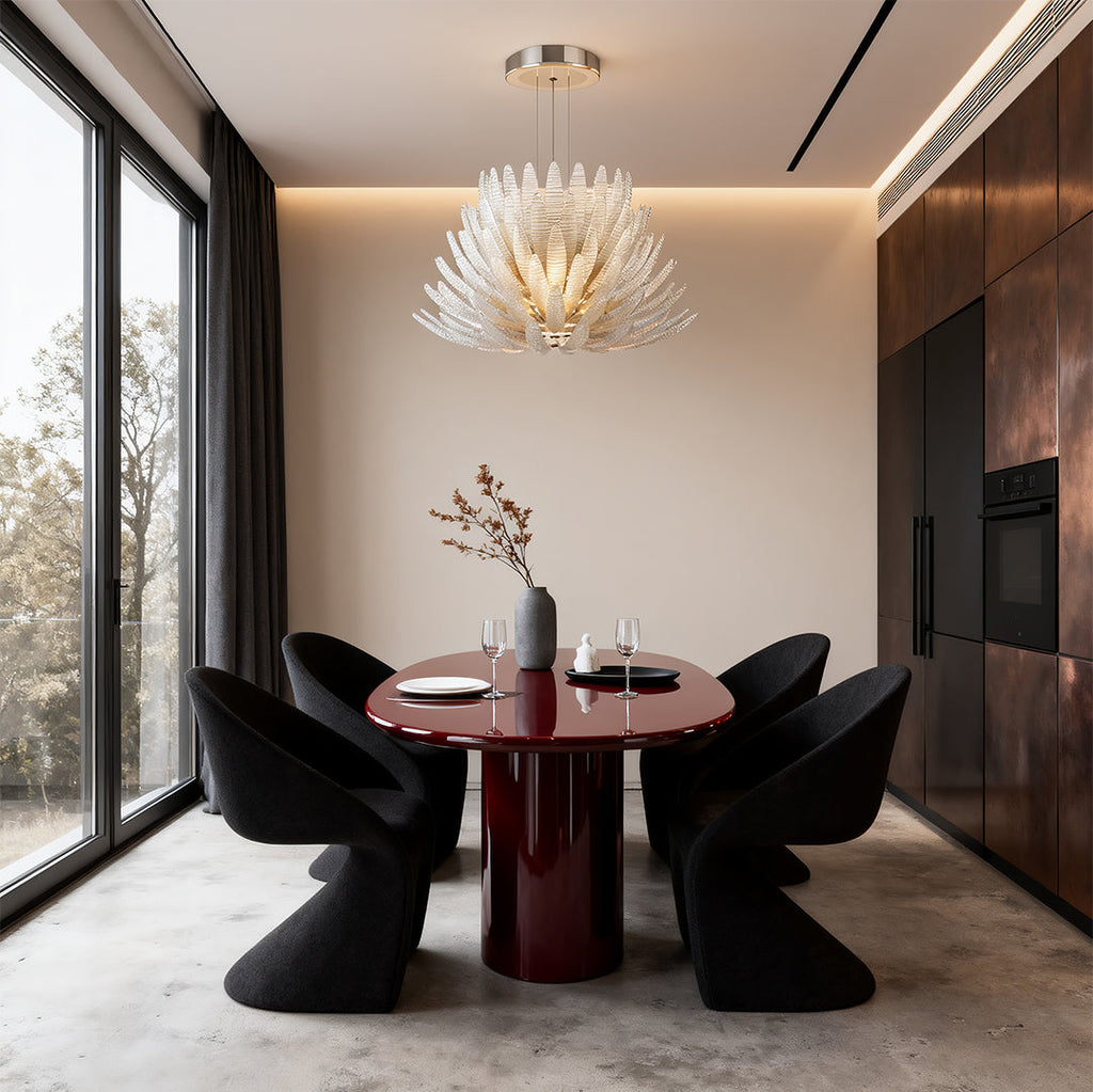 Deco chandelier above a round table in a modern interior