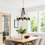 Geometric eight-light chandelier below a rustic vaulted ceiling