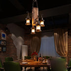 Vintage industrial wood chandelier in a cozy dining area