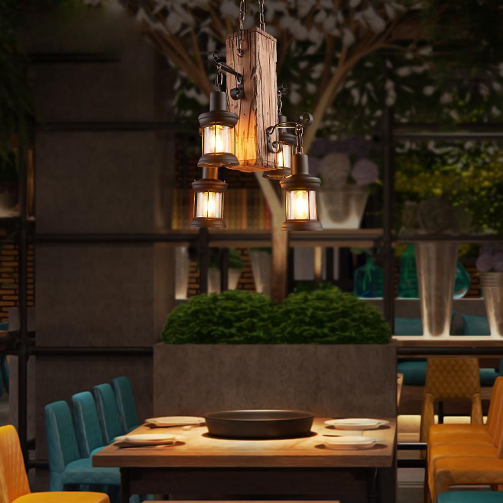 Rustic wood lantern chandelier lighting a restaurant interior
