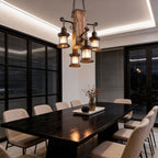 Wood lantern chandelier softly lighting a contemporary dining table