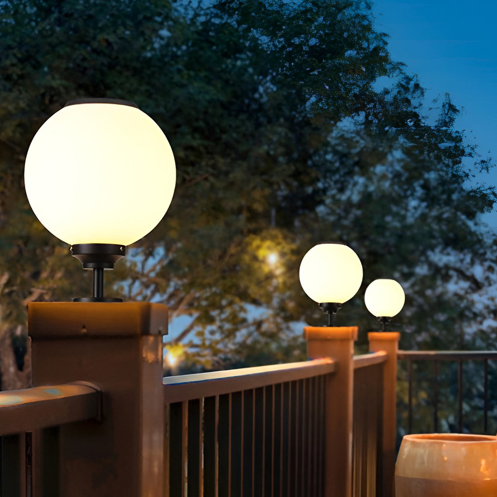 Sleek spherical pillar light on a wooden deck post