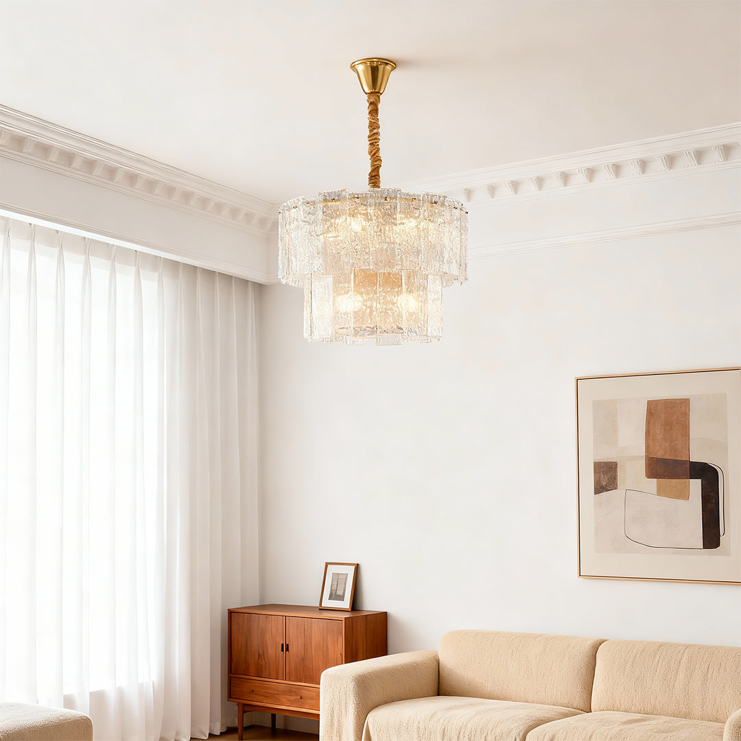 Small chandelier in a serene beige bedroom with sheer curtains