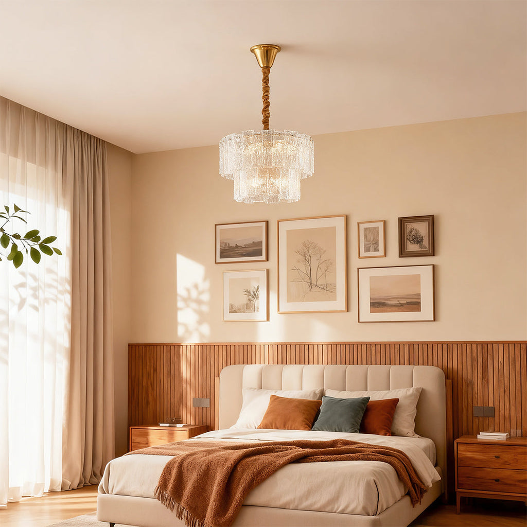 Small chandelier beside a warm wood slat gallery wall