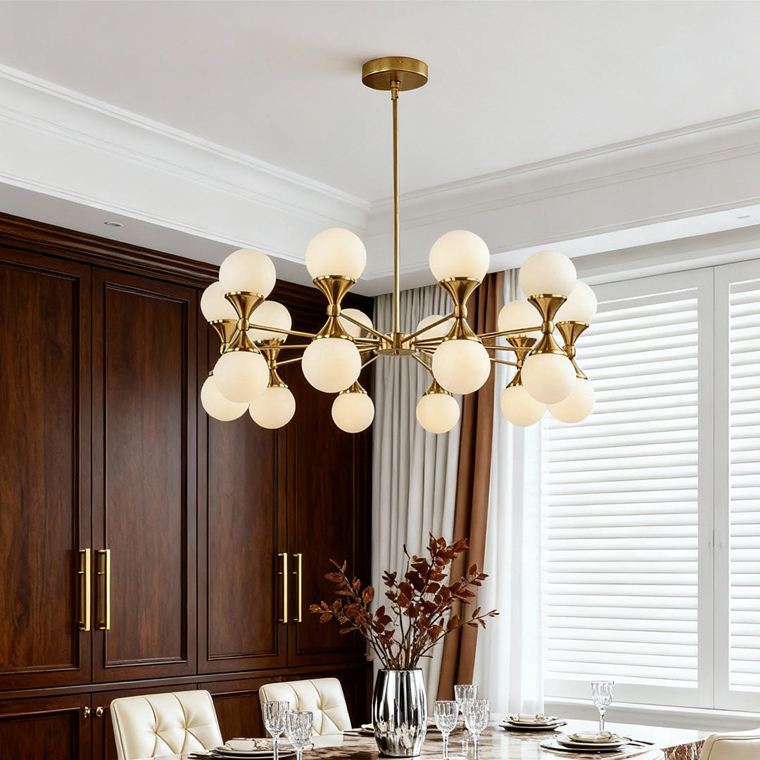 Sophisticated gold bubble chandelier above dark wood
