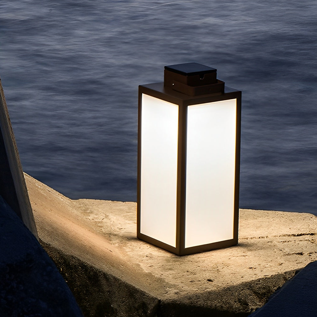 Square lantern with modern design on stone garden steps