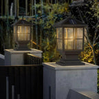 Black lantern giving elegant light at a waterfront setting