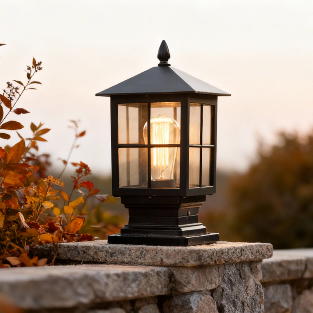 Black lantern giving soft light in an autumn garden