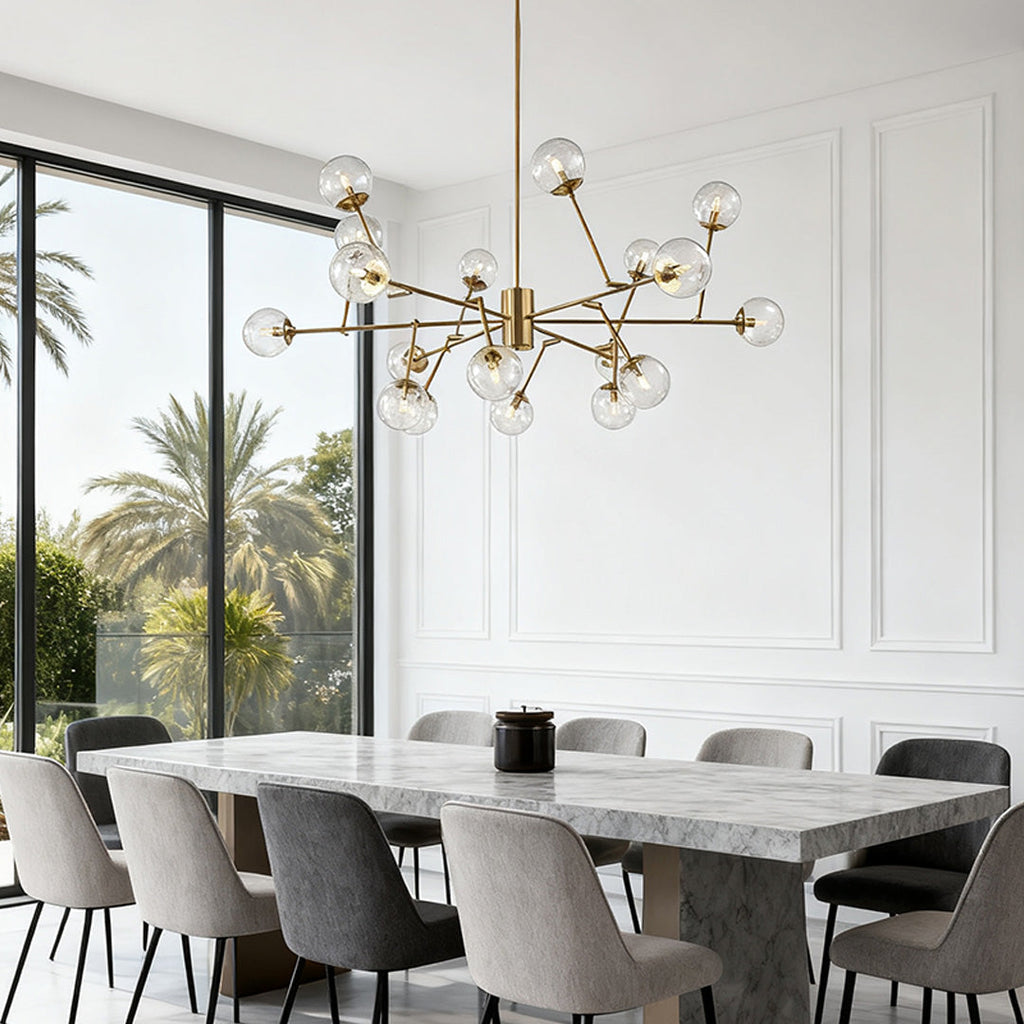 Gold bubble sputnik chandelier below a vaulted ceiling
