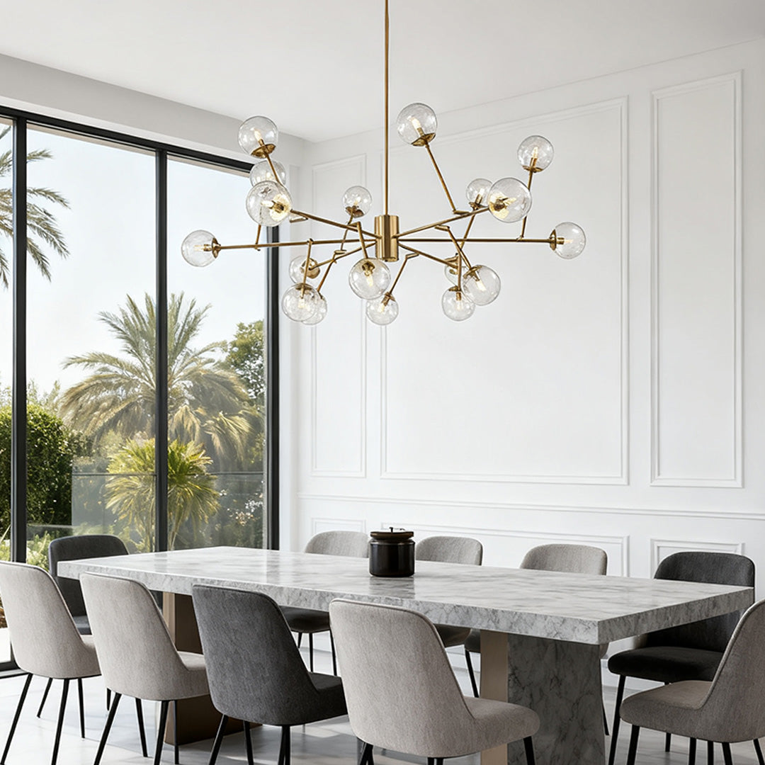 Gold bubble sputnik chandelier below a vaulted ceiling