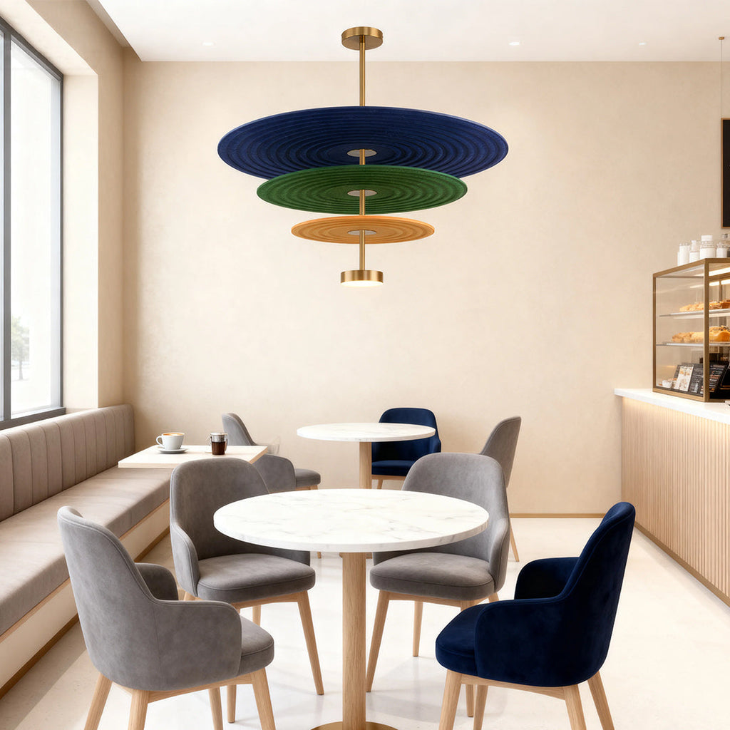 Felt tier chandelier hanging above cozy cafe seating