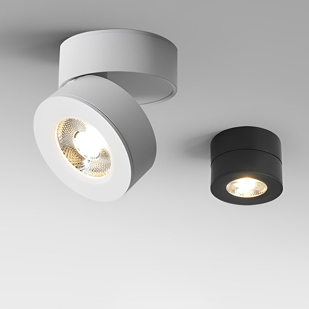 Black directional surface spotlight in a modern interior setting