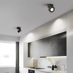 Surface spotlight aimed at a kitchen countertop work surface