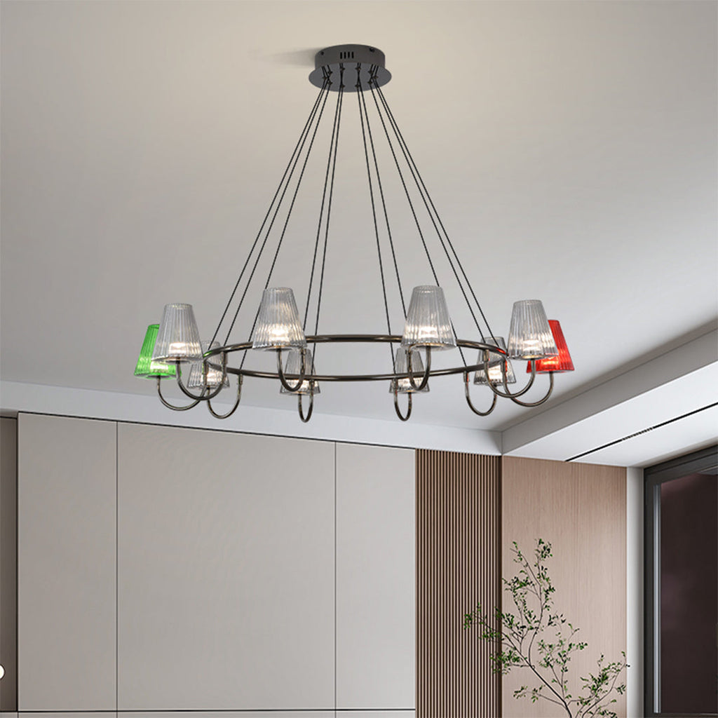 Six colorful shades hanging from the chandelier's ceiling mount