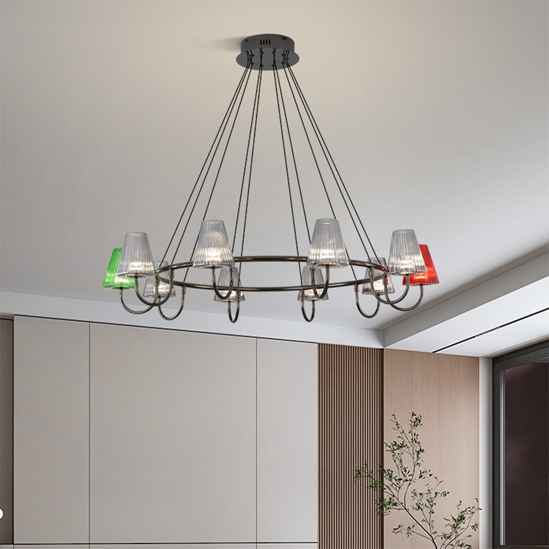 Six colorful shades hanging from the chandelier's ceiling mount