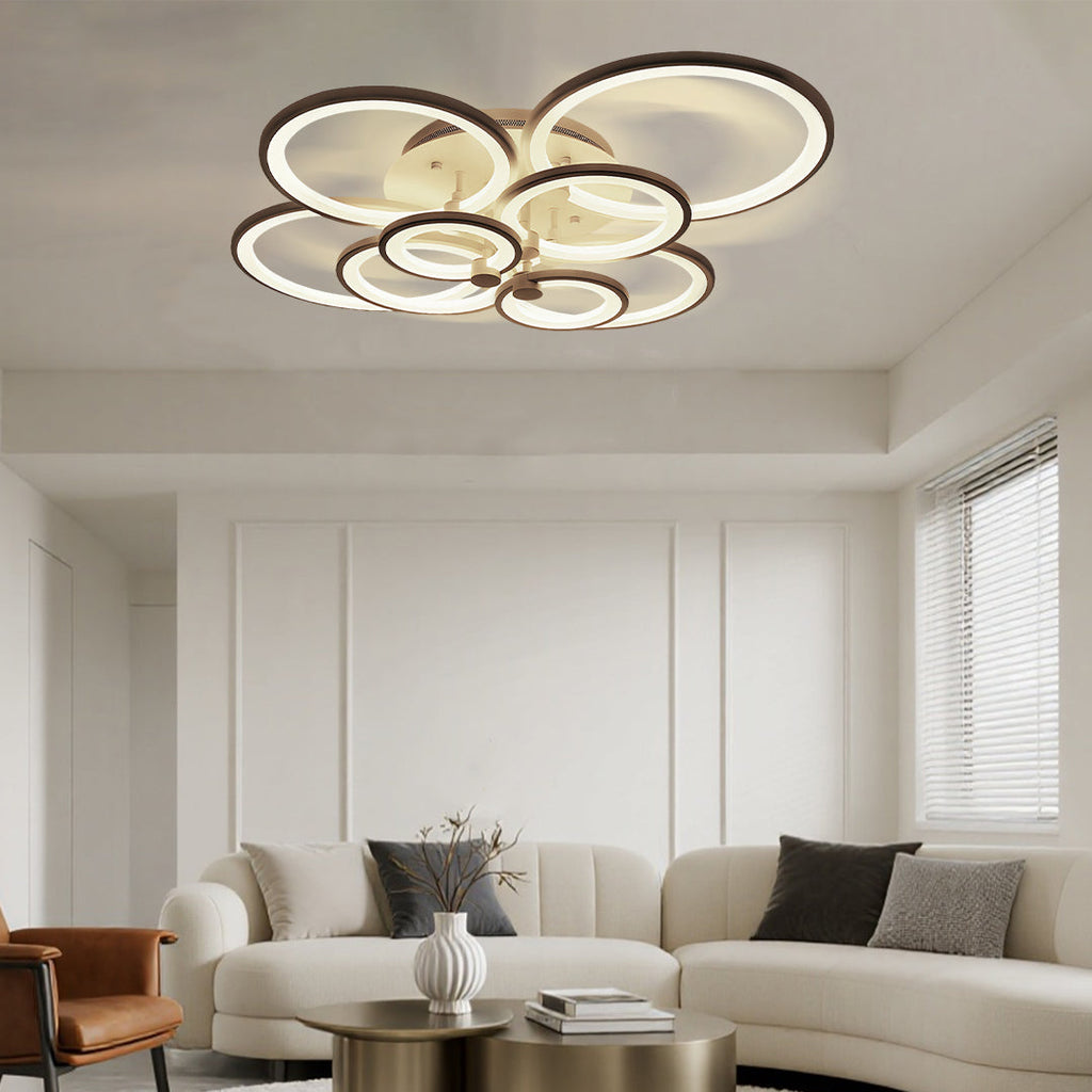 Symmetrically arranged ring ceiling light in a living room