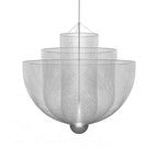 Symmetrical view of the tiered silver mesh chandelier lit up