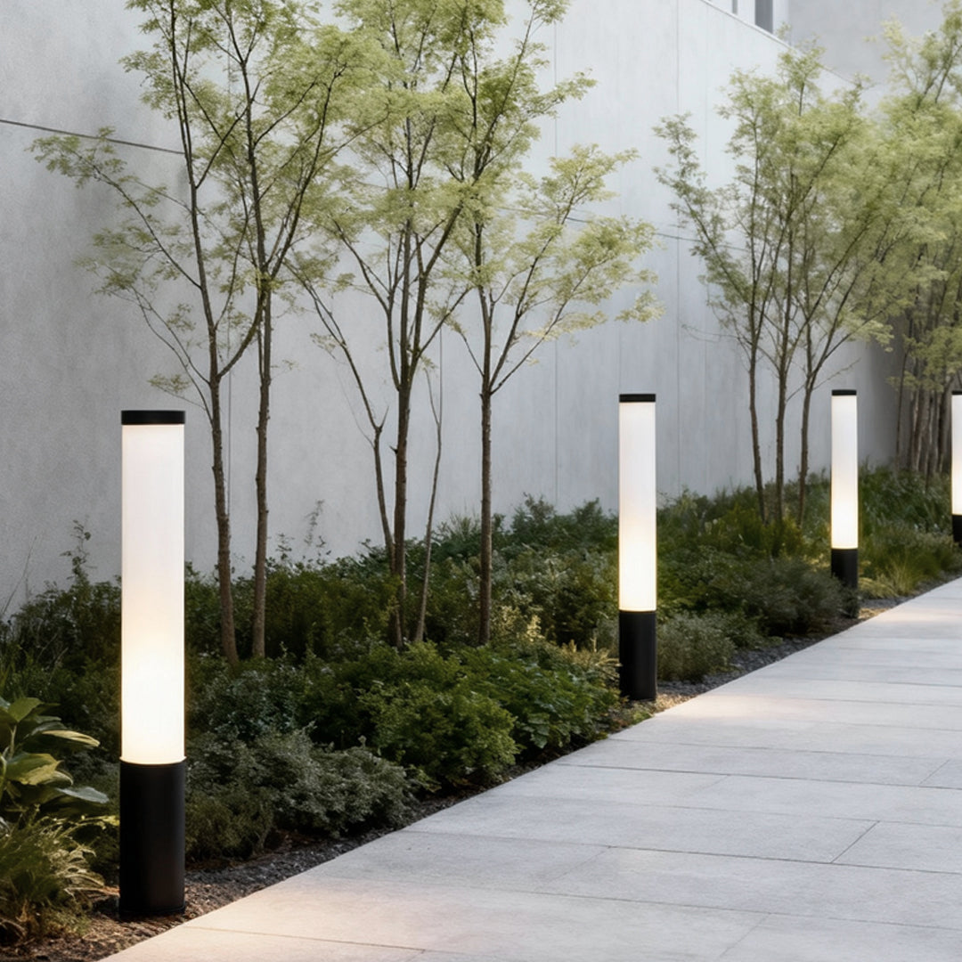 Tube landscape light on a minimalist modern garden pathway
