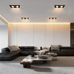 Twin recessed ceiling lights in a contemporary living room
