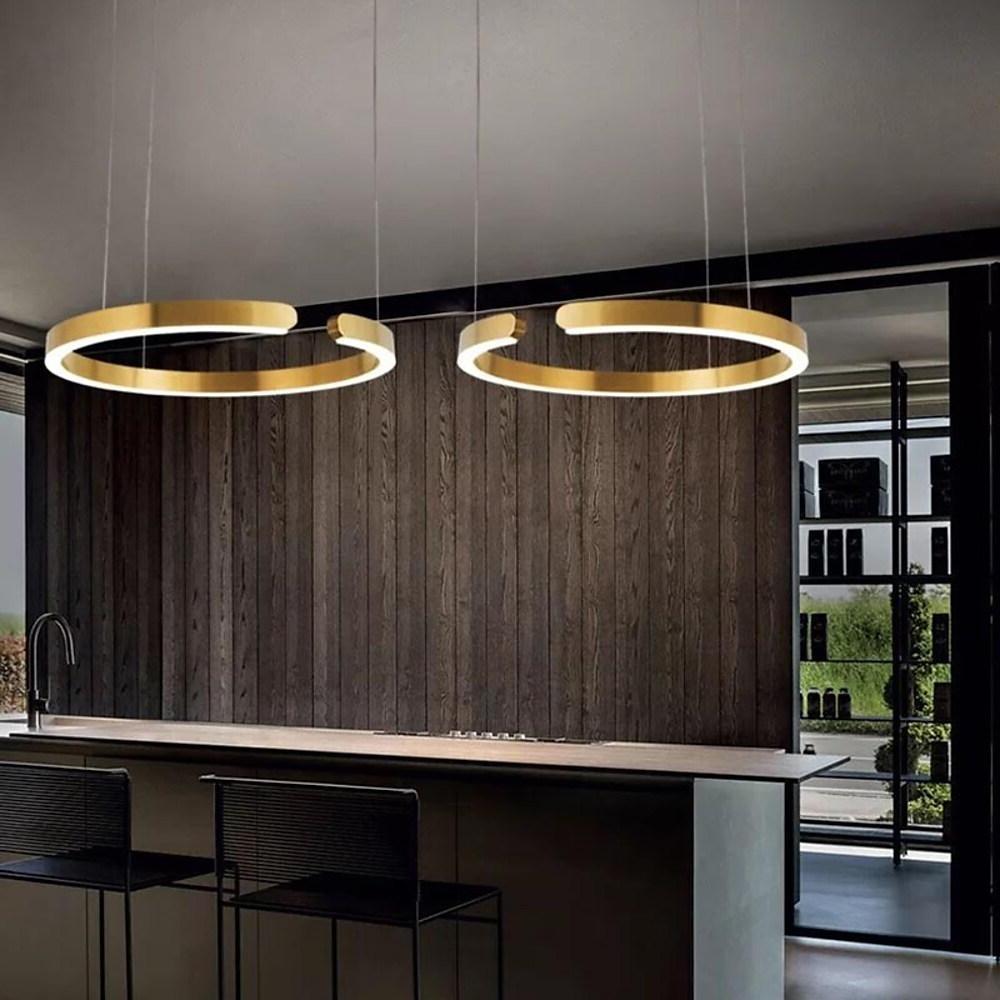 Ring pendant light shown lit from a side angle