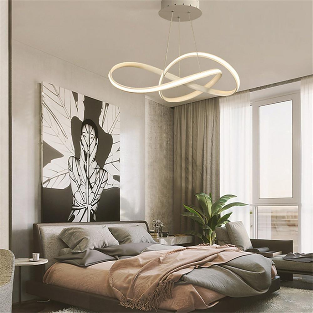 Mobius ring pendant light providing ceiling illumination indoors