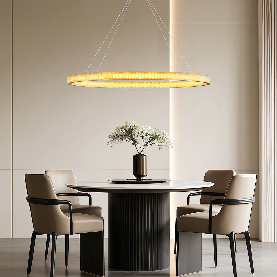 Crystal chandelier in a room with built-in shelving